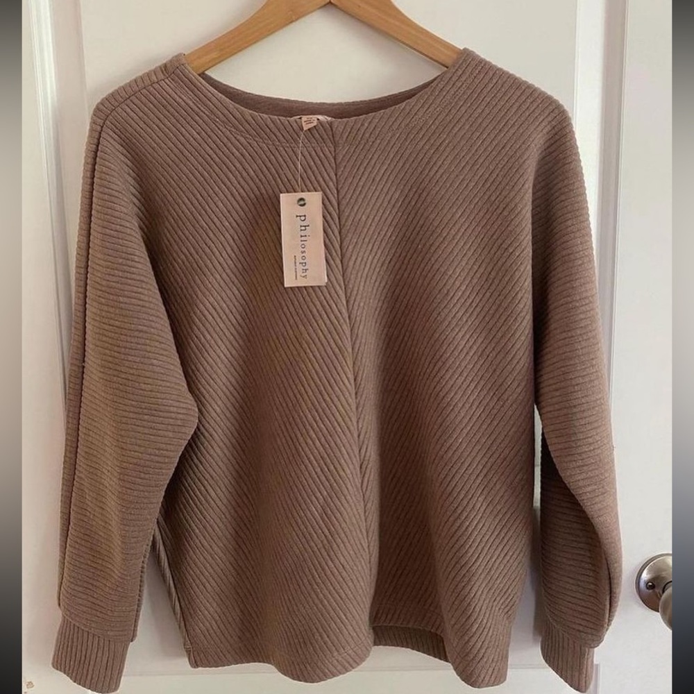 Philosophy republic clothing brown sweater
never worn still has tags zero flaws